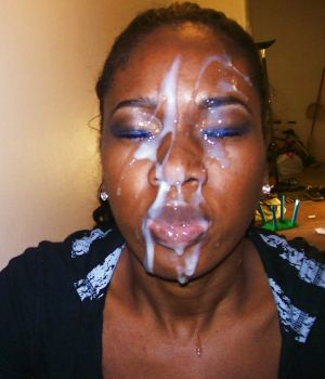 Black babe messy cumshot in her face